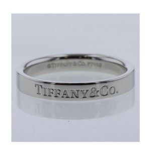 Platinum Tiffany & Co. logo band…pure platinum…hard to come by..size 8